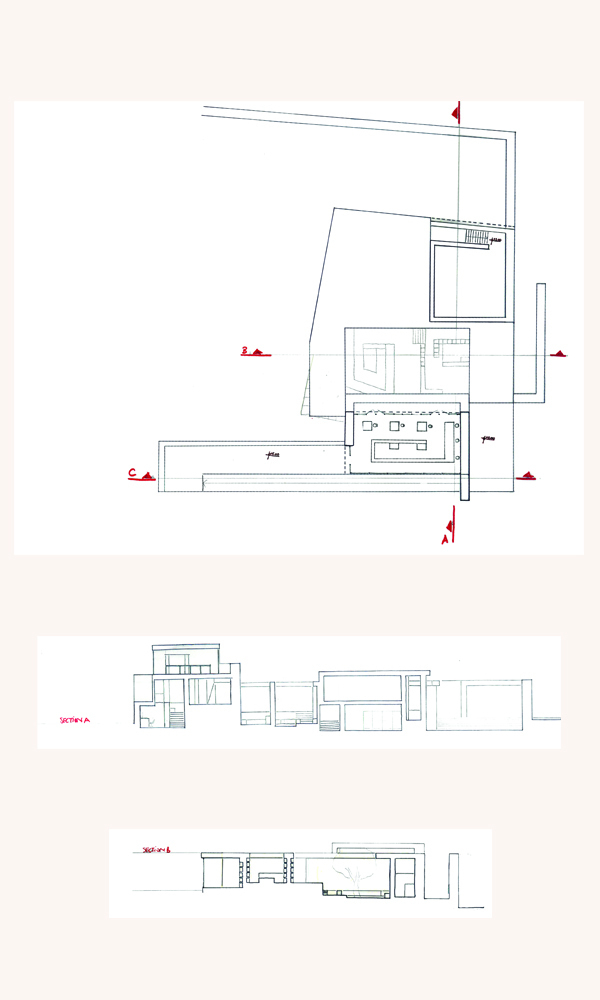 upper floor plan with intersecting sections showing the use of elevations to seperate functions